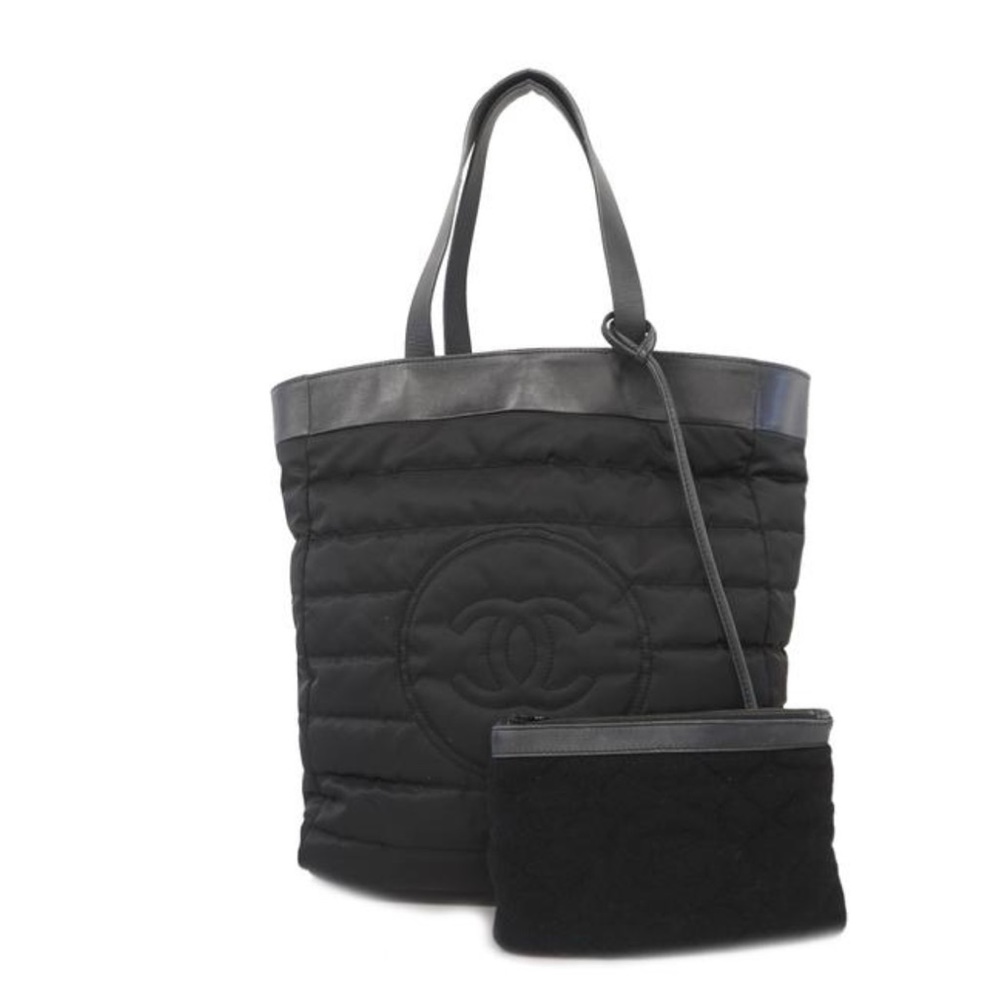 Black Chanel sporty bag.
